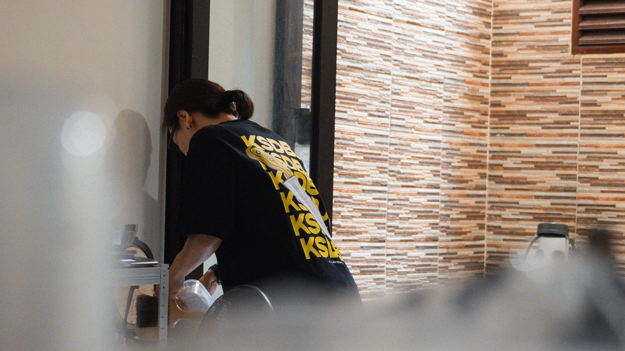 Someone working in the KSDBJ kitchen.